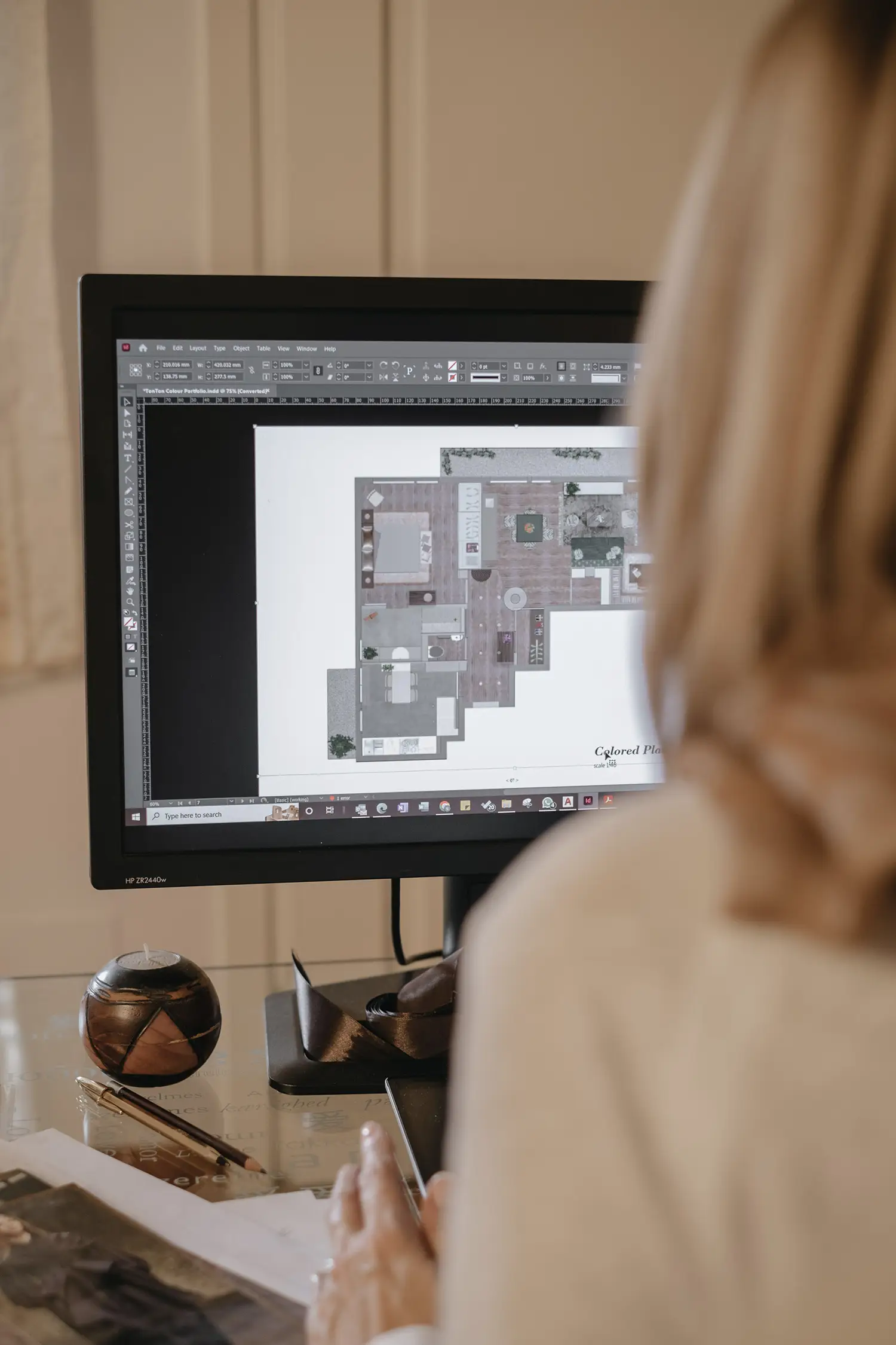 Interior designer Stefania Luraghi, founder of studio Elles Interior Design , working on the plan of a turnkey renovation project.